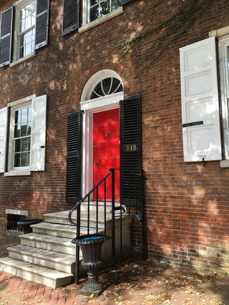 Brick house with newly painted white trim