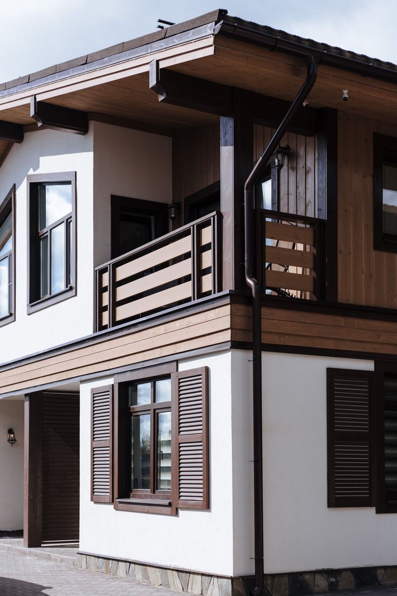 Two-story house with freshly painted siding and trim