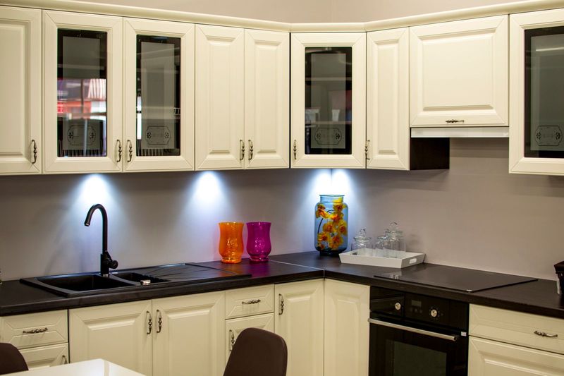 Kitchen with freshly painted white cabinets